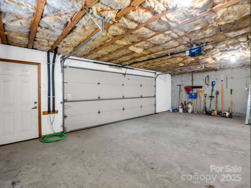 780 Rixhaven Drive, Saluda, NC 28773.  MLS# CAR4246411, YatesRealty ID 8140. 2 Car Garge in Basement