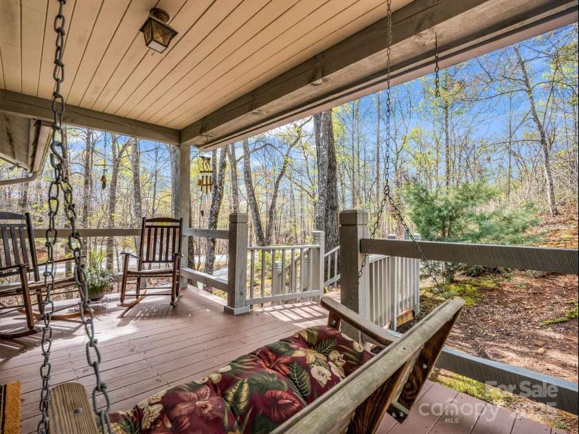 780 Rixhaven Drive, Saluda, NC 28773.  MLS# CAR4246411, YatesRealty ID 8140. Front Porch Relaxing - Rock or Swing