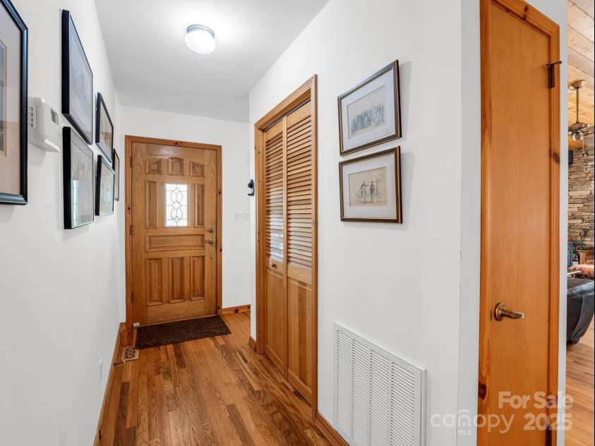 780 Rixhaven Drive, Saluda, NC 28773.  MLS# CAR4246411, YatesRealty ID 8140. Rocking Chair Front Porch