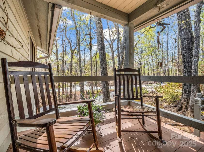 780 Rixhaven Drive, Saluda, NC 28773.  MLS# CAR4246411, YatesRealty ID 8140. Truly a Rocking Chair Front Porch