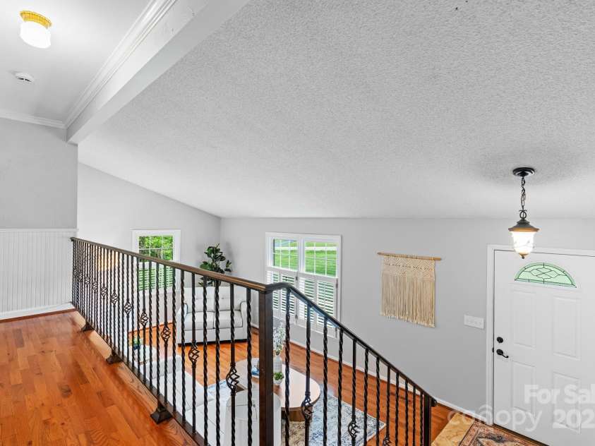 5486 Suttlemyre Lane, Hickory, NC 28601.  MLS# CAR4249269, YatesRealty ID 8145. Upstairs overlooks the Living room/ Dining room or whatever you wish to use this flex space for!!