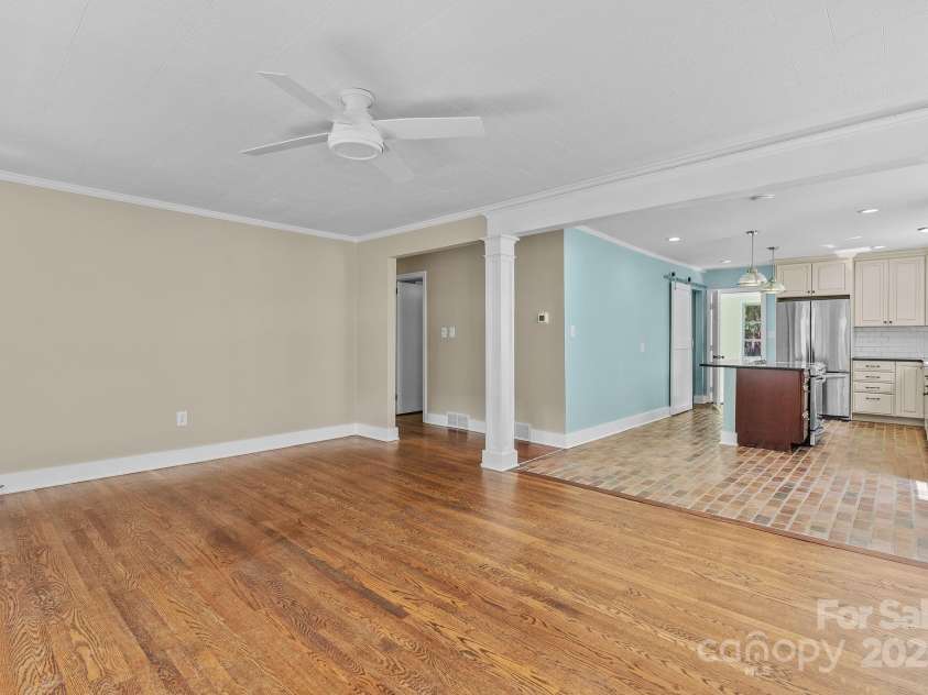 318 Stoney Mountain Road, Hendersonville, NC 28791.  MLS# CAR4235178, YatesRealty ID 8150. The open floor plan creates a friendly, liveable space in this happy home.