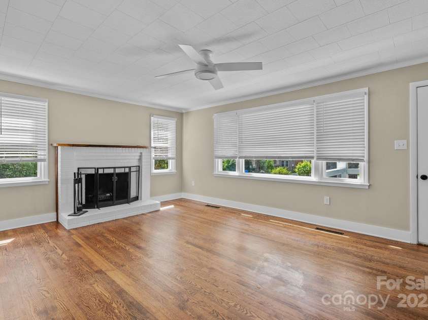 318 Stoney Mountain Road, Hendersonville, NC 28791.  MLS# CAR4235178, YatesRealty ID 8150. Windows feature coverings that convey. Light fixtures throughout the home have been updated.