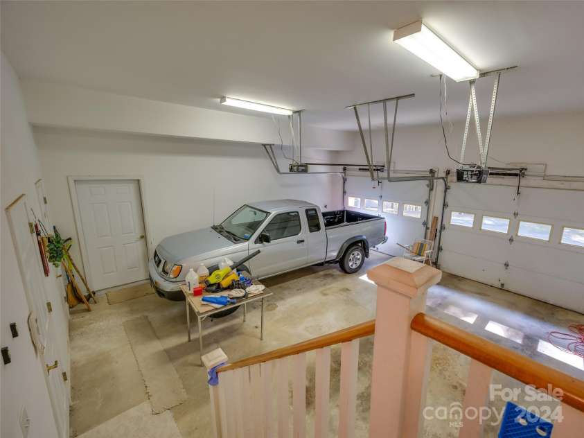 65 Winfield Cove, Saluda, NC 28773.  MLS# CAR4076540, YatesRealty ID 8151. 2 gar garage