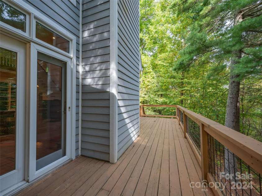 65 Winfield Cove, Saluda, NC 28773.  MLS# CAR4076540, YatesRealty ID 8151. Back deck