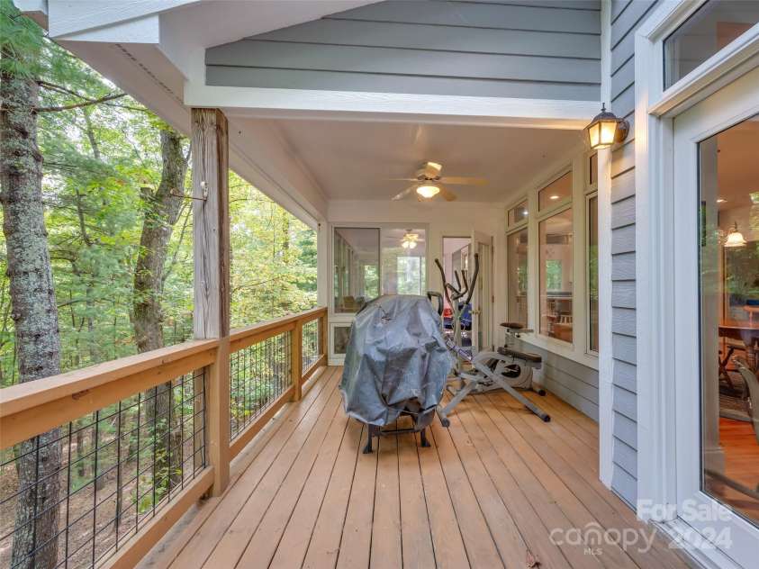 65 Winfield Cove, Saluda, NC 28773.  MLS# CAR4076540, YatesRealty ID 8151. Back deck