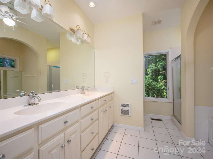 65 Winfield Cove, Saluda, NC 28773.  MLS# CAR4076540, YatesRealty ID 8151. Primary Bathroom