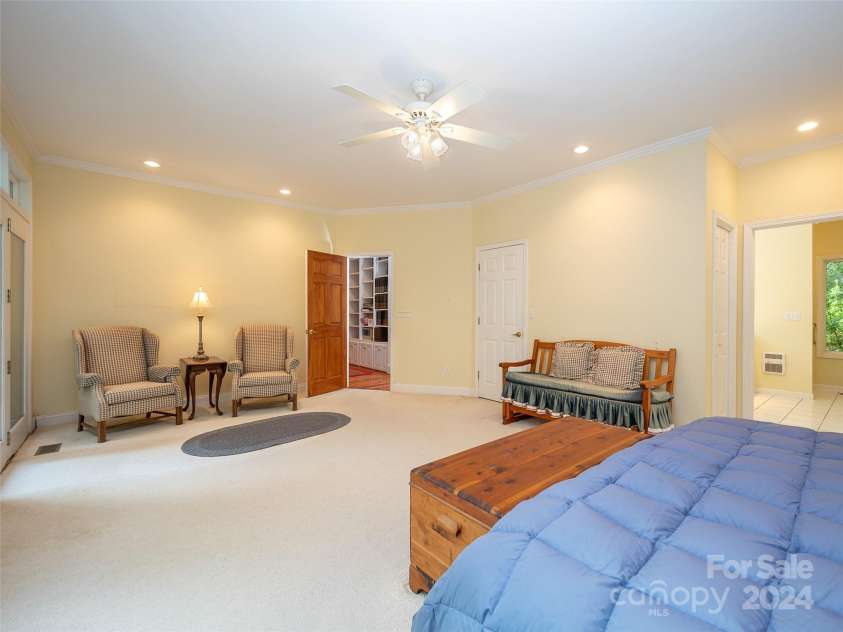 65 Winfield Cove, Saluda, NC 28773.  MLS# CAR4076540, YatesRealty ID 8151. Spacious Primary Bedroom