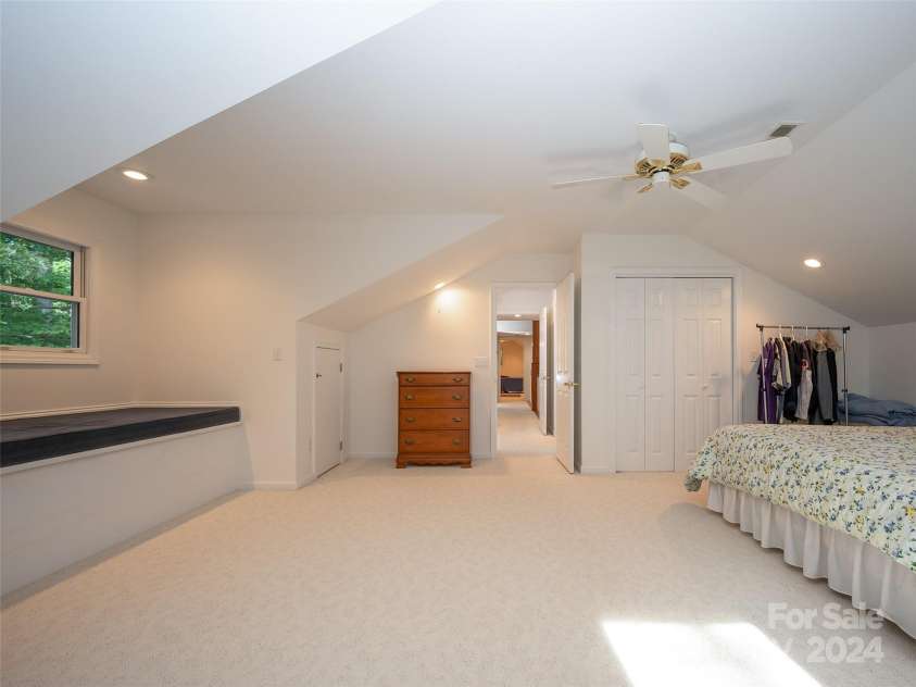 65 Winfield Cove, Saluda, NC 28773.  MLS# CAR4076540, YatesRealty ID 8151. Upstairs room to left