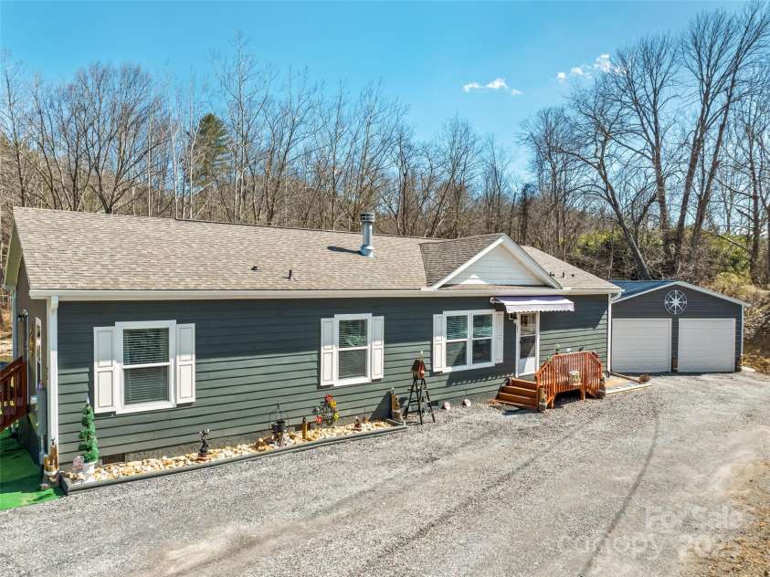 21 Swift Stream Lane, Waynesville, NC 28785.  MLS# CAR4227039, YatesRealty ID 8155. DETACHED 2 CAR GARAGE