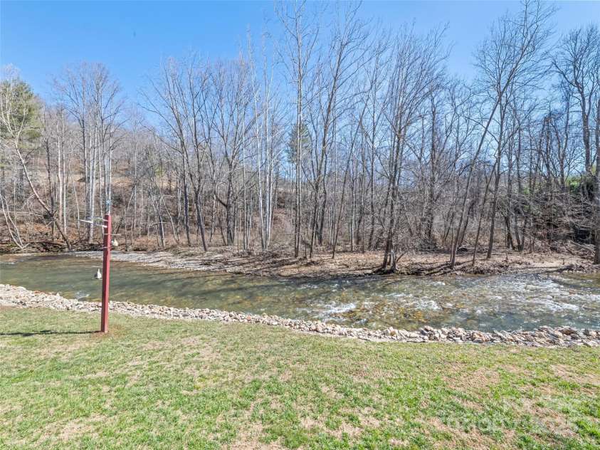 21 Swift Stream Lane, Waynesville, NC 28785.  MLS# CAR4227039, YatesRealty ID 8155. FISH FROM YOUR BACKYARD