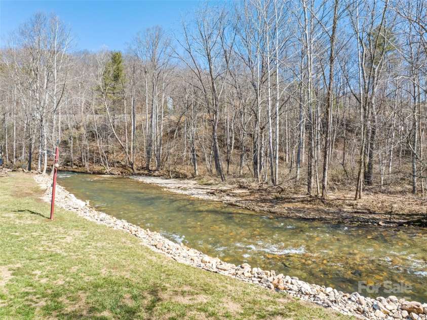21 Swift Stream Lane, Waynesville, NC 28785.  MLS# CAR4227039, YatesRealty ID 8155. LOOKING DOWNSTREAM