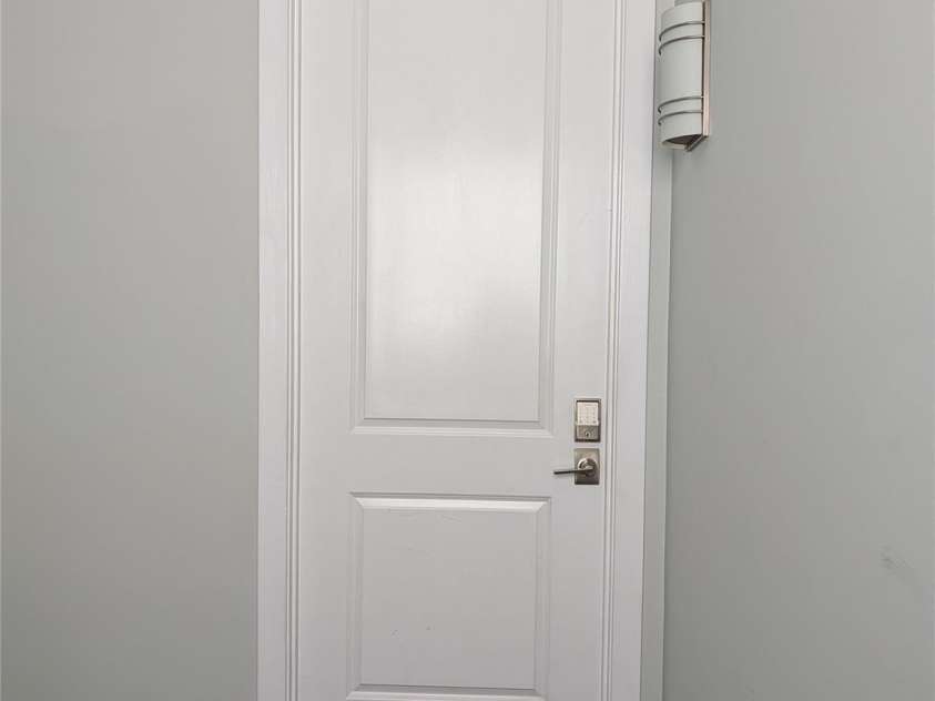 360 Exchange Street, Concord, NC 28027.  MLS# CAR4321208, YatesRealty ID 816. Entrance to the unit - beautiful tile floor and nine foot doors create a wonderful feel to this unit. 