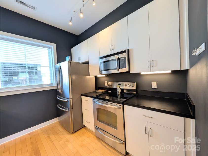 360 Exchange Street, Concord, NC 28027.  MLS# CAR4321208, YatesRealty ID 816. Kitchen with lots of light