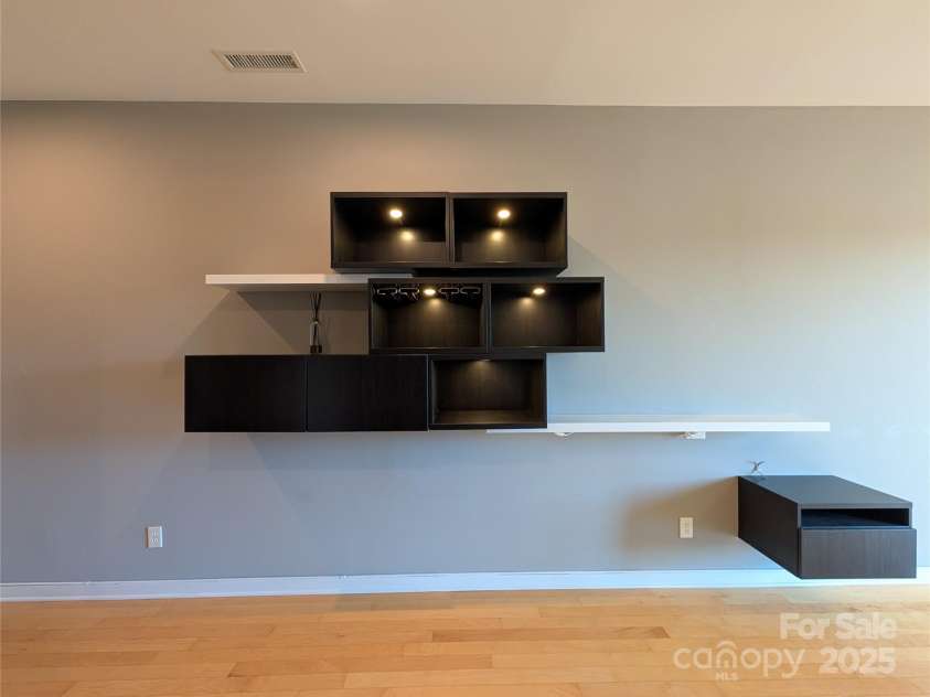 360 Exchange Street, Concord, NC 28027.  MLS# CAR4321208, YatesRealty ID 816. Lots of unique shelving to be included.