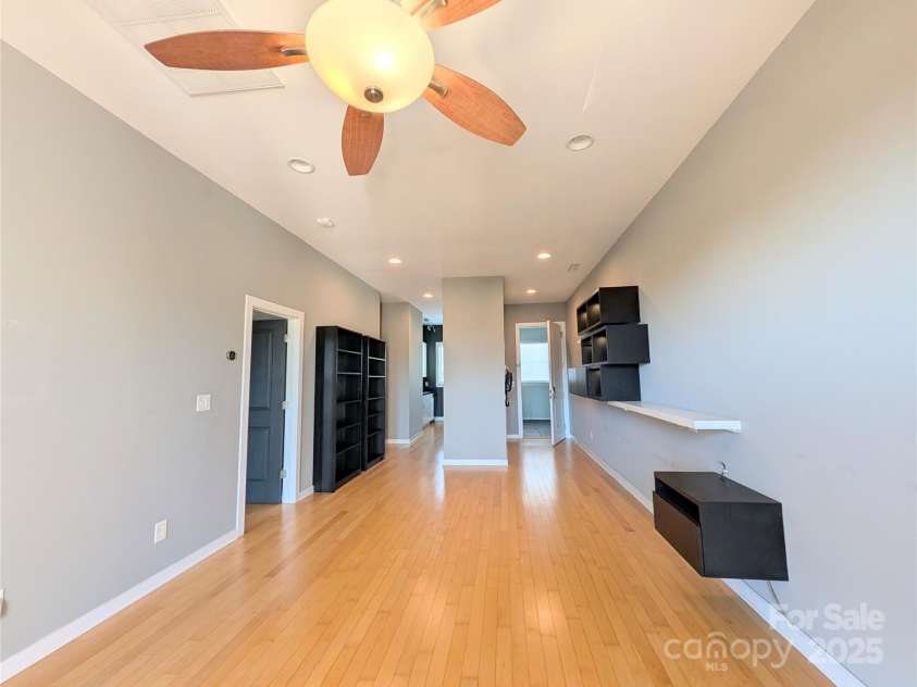 360 Exchange Street, Concord, NC 28027.  MLS# CAR4321208, YatesRealty ID 816. Main living area - primary bedroom off to the left, kitchen to the back left - entry door to the far right 