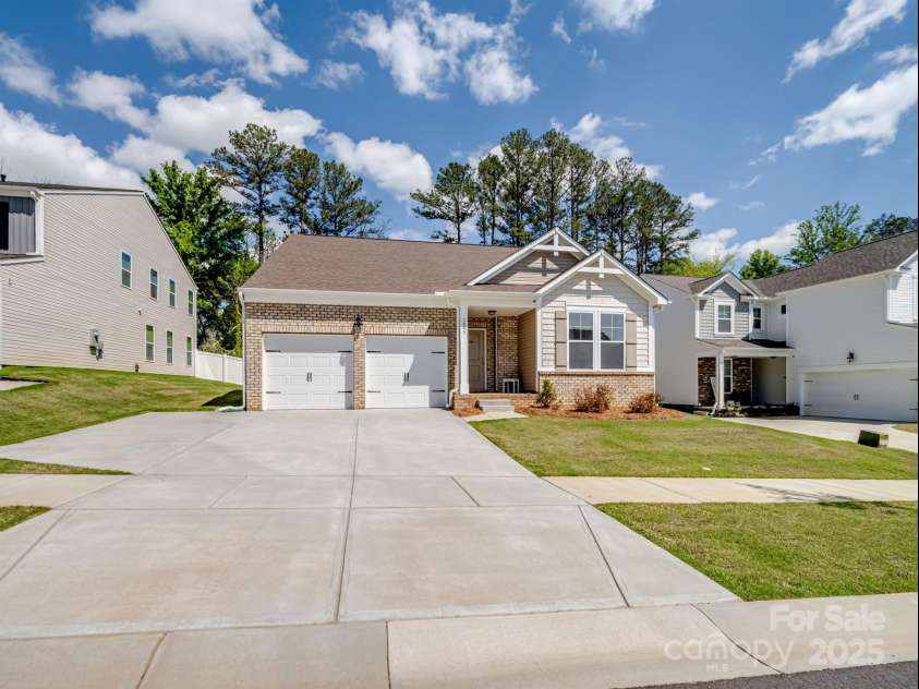 1045 Cavalier Lane, Rock Hill, SC 29730.  MLS# CAR4244737, YatesRealty ID 8160. Driveway features large pad with extra parking space