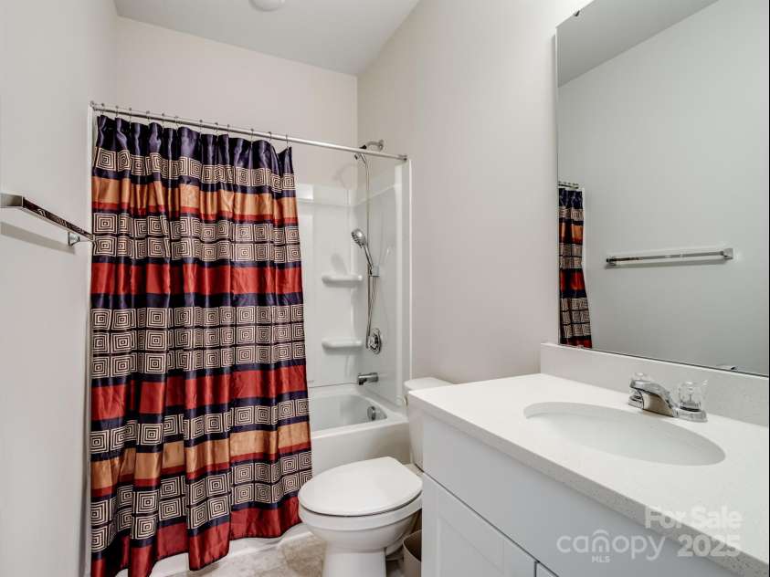 1045 Cavalier Lane, Rock Hill, SC 29730.  MLS# CAR4244737, YatesRealty ID 8160. Full bathroom next to Bedroom 1 on main floor