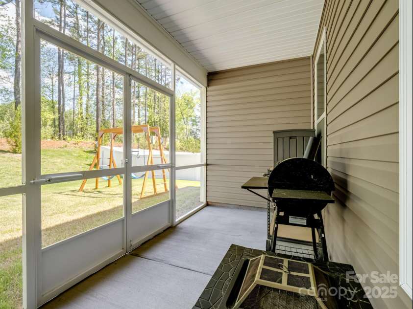 1045 Cavalier Lane, Rock Hill, SC 29730.  MLS# CAR4244737, YatesRealty ID 8160. Screened-in patio