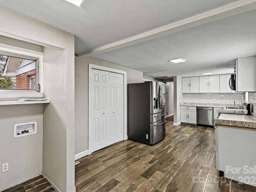 1407 17th Avenue, Hickory, NC 28601.  MLS# CAR4232317, YatesRealty ID 8167. Laundry Area/Dining Area View