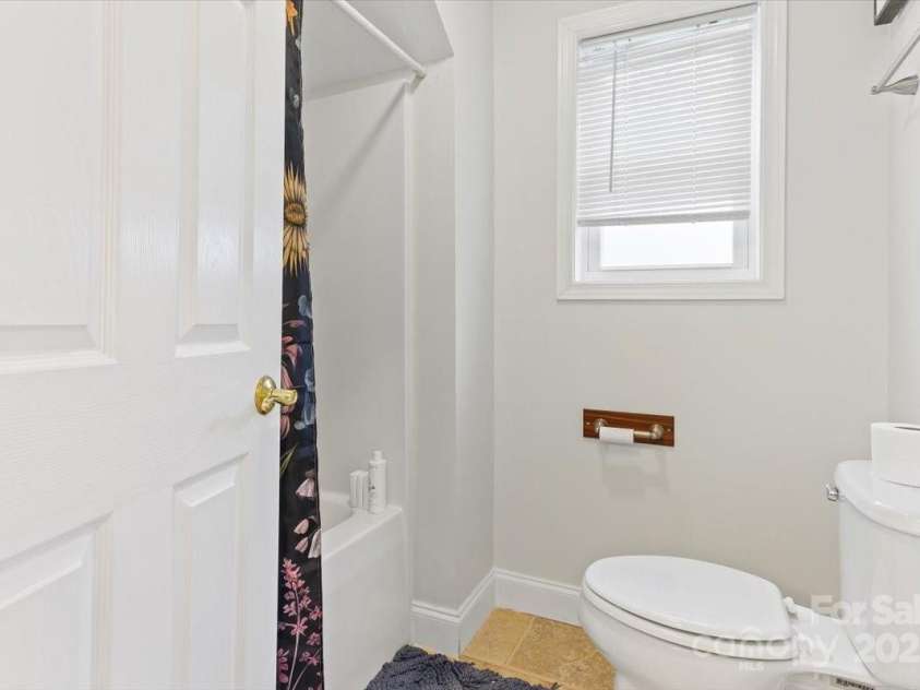 54 Fairview Street, Asheville, NC 28803.  MLS# CAR4237978, YatesRealty ID 8169. Apartment bathroom