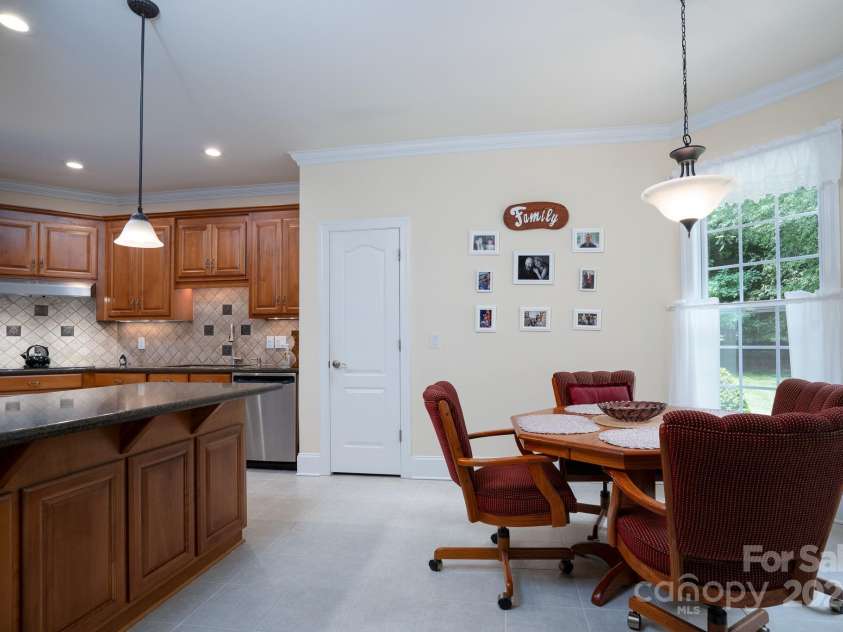119 Barton Place, Mooresville, NC 28117.  MLS# CAR4218904, YatesRealty ID 817. Kitchen with eat in area