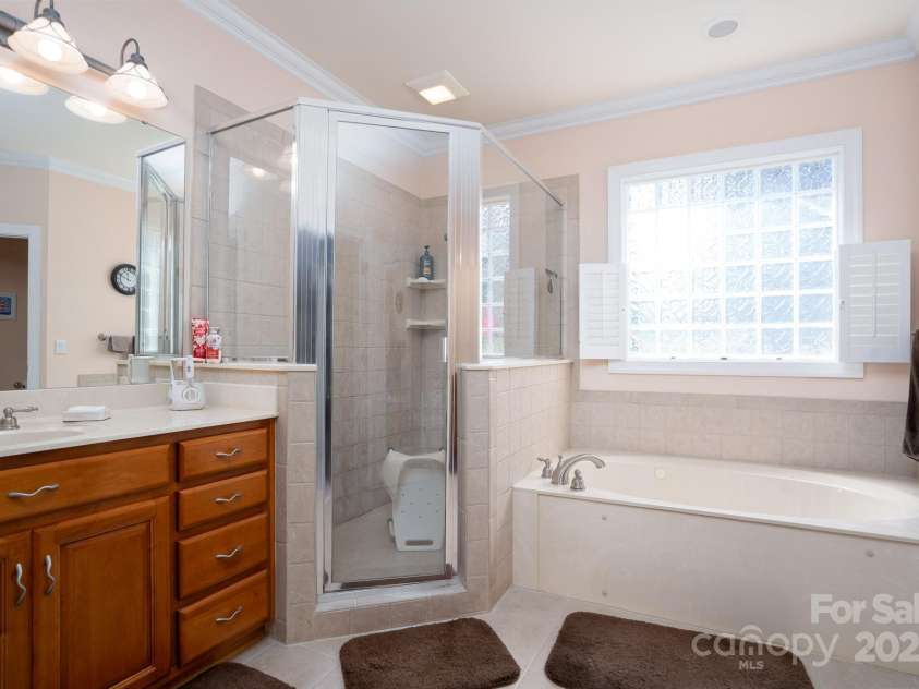 119 Barton Place, Mooresville, NC 28117.  MLS# CAR4218904, YatesRealty ID 817. Primary bathroom