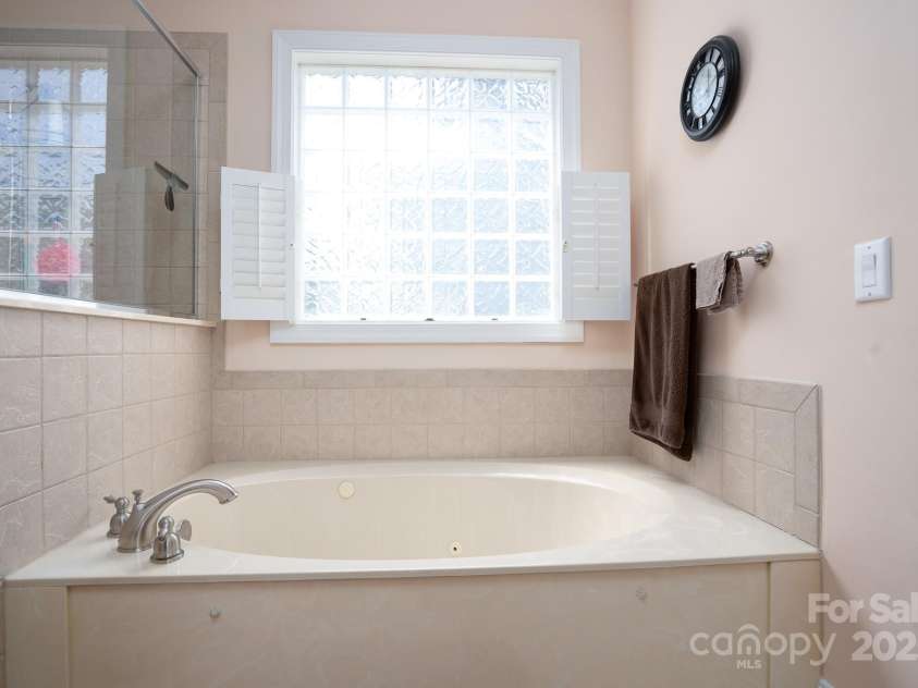 119 Barton Place, Mooresville, NC 28117.  MLS# CAR4218904, YatesRealty ID 817. Primary bathroom