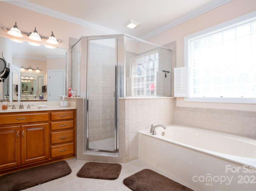 119 Barton Place, Mooresville, NC 28117.  MLS# CAR4218904, YatesRealty ID 817. Primary bathroom