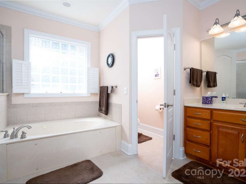 119 Barton Place, Mooresville, NC 28117.  MLS# CAR4218904, YatesRealty ID 817. Primary bathroom