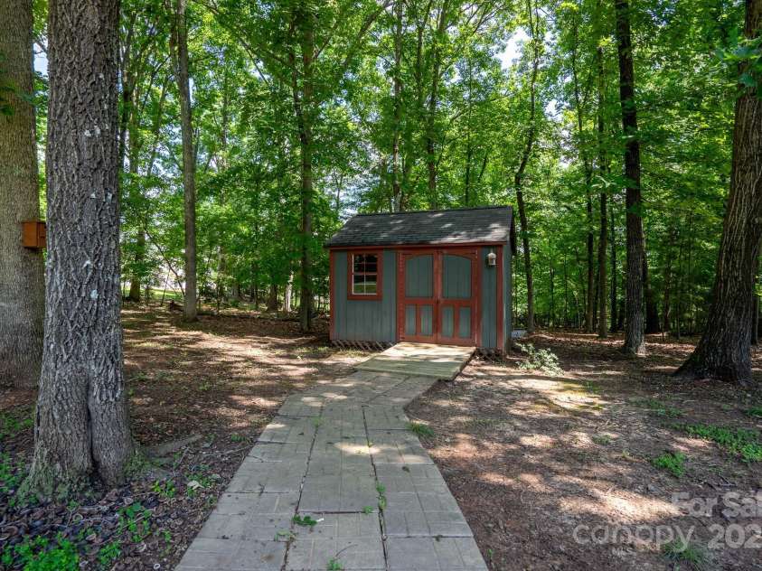 119 Barton Place, Mooresville, NC 28117.  MLS# CAR4218904, YatesRealty ID 817. Shed in backyard