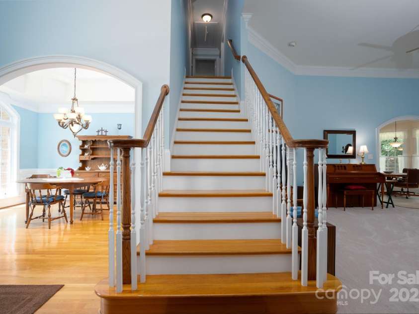 119 Barton Place, Mooresville, NC 28117.  MLS# CAR4218904, YatesRealty ID 817. Stairs to second story