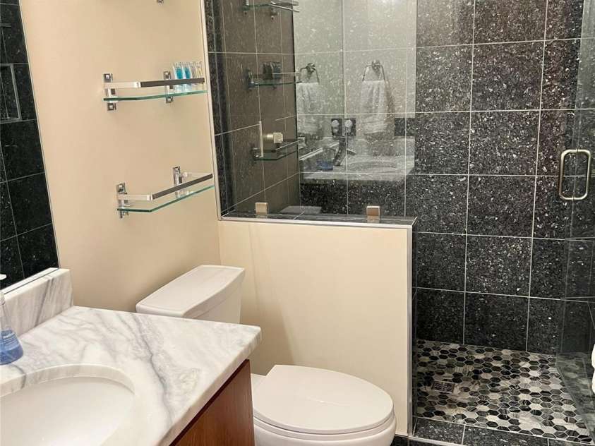 57 Union Chapel Road, Weaverville, NC 28787.  MLS# CAR4307252, YatesRealty ID 817. Apartment Bathroom