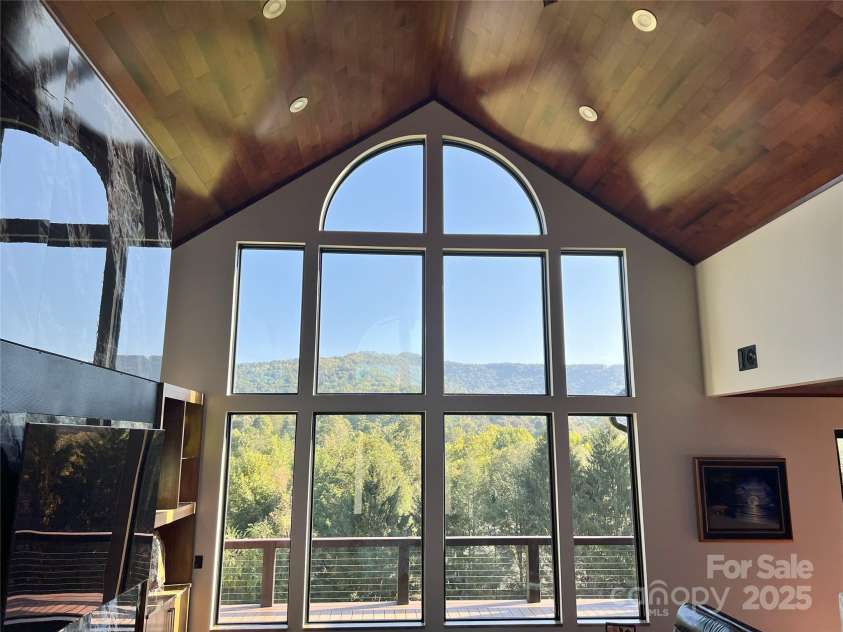 57 Union Chapel Road, Weaverville, NC 28787.  MLS# CAR4307252, YatesRealty ID 817. Living Room Looking Back