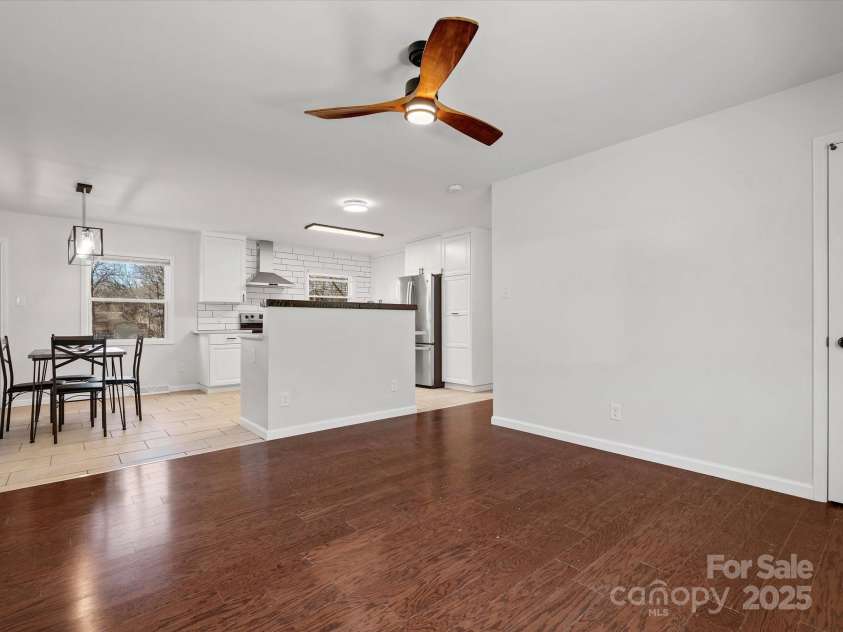 724 Merridale Drive, Charlotte, NC 28214.  MLS# CAR4228503, YatesRealty ID 8170. Open concept living room / kitchen design