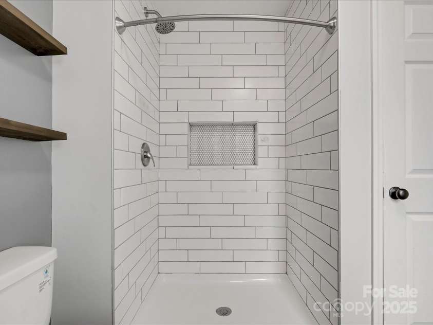 724 Merridale Drive, Charlotte, NC 28214.  MLS# CAR4228503, YatesRealty ID 8170. Stand up tile shower