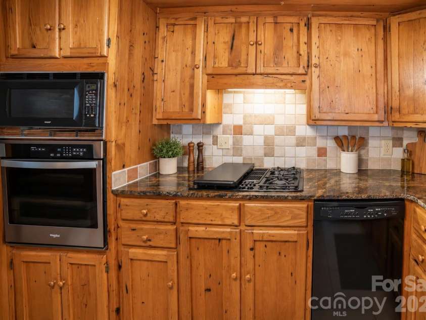 1368 Cajah Mountain Road, Hudson, NC 28638.  MLS# CAR4364291, YatesRealty ID 8171. Desirable Wall Oven and Microwave Space