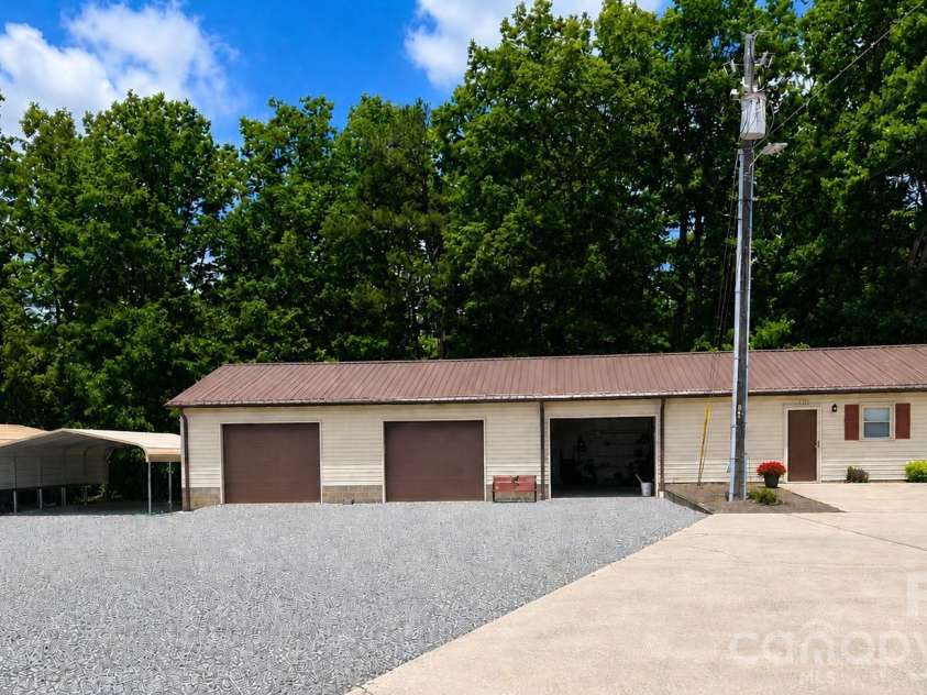 1368 Cajah Mountain Road, Hudson, NC 28638.  MLS# CAR4364291, YatesRealty ID 8171. Detached Triple Garage and 2 BDRM Apartment