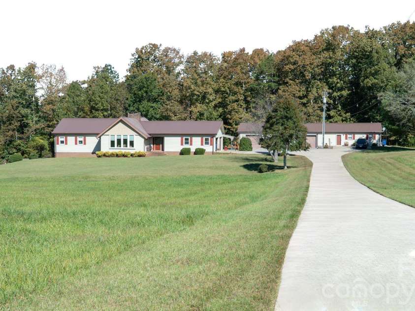 1368 Cajah Mountain Road, Hudson, NC 28638.  MLS# CAR4364291, YatesRealty ID 8171. Extended Entry and Sprawling Front Lawn