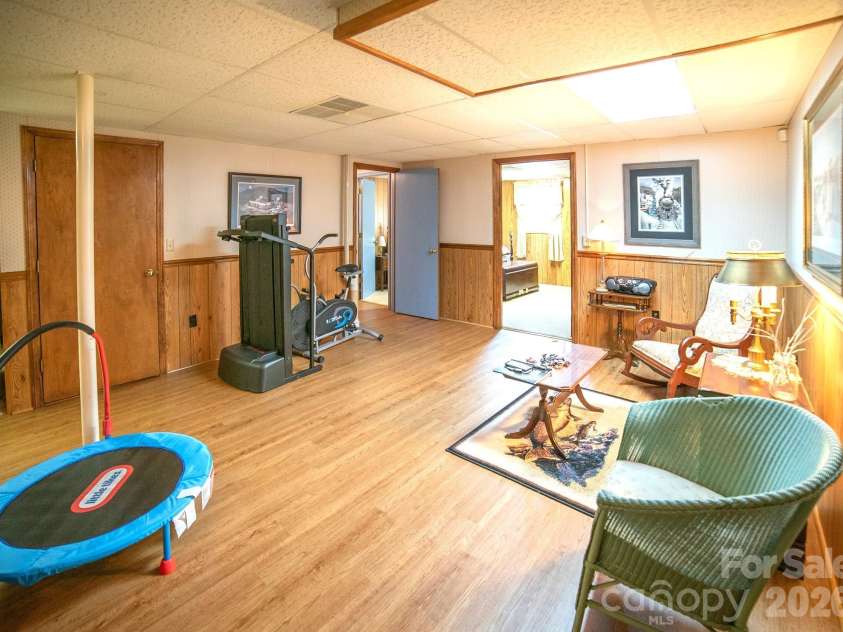 1368 Cajah Mountain Road, Hudson, NC 28638.  MLS# CAR4364291, YatesRealty ID 8171. Lower Level game/rec room.