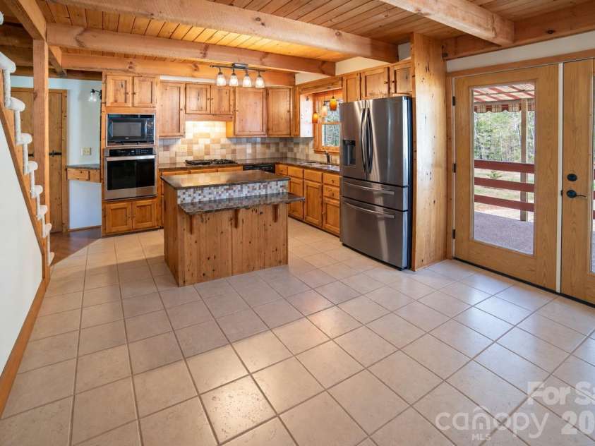 1368 Cajah Mountain Road, Hudson, NC 28638.  MLS# CAR4364291, YatesRealty ID 8171. Open and Spacious Kitchen w/Island