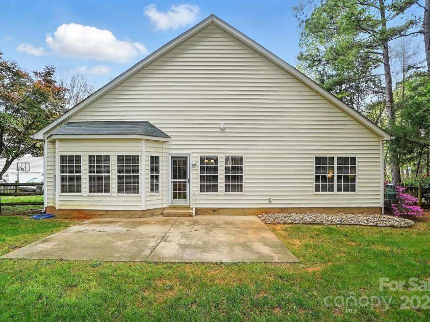 212 Kilborne Road, Mooresville, NC 28117.  MLS# CAR4245261, YatesRealty ID 8173. Back of Home