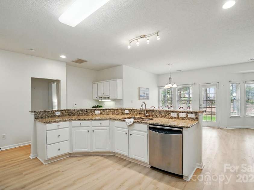 212 Kilborne Road, Mooresville, NC 28117.  MLS# CAR4245261, YatesRealty ID 8173. Kitchen Opens into Breakfast and Great Room