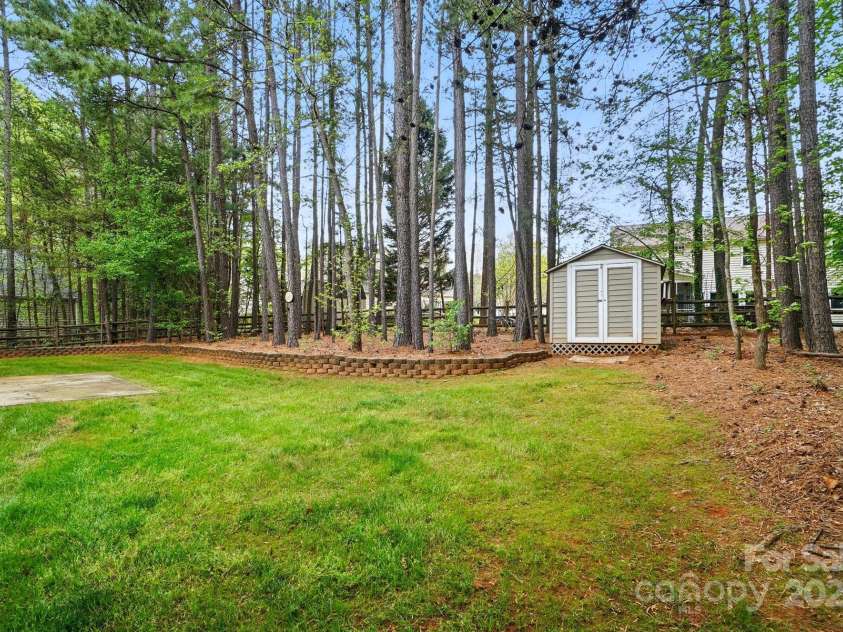 212 Kilborne Road, Mooresville, NC 28117.  MLS# CAR4245261, YatesRealty ID 8173. Private Fence Backyard w/Shed