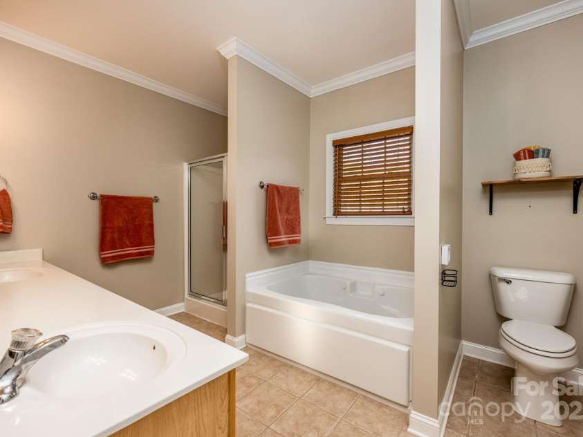 412 Wildlife Road, Troutman, NC 28166.  MLS# CAR4212088, YatesRealty ID 8174. Primary Bath