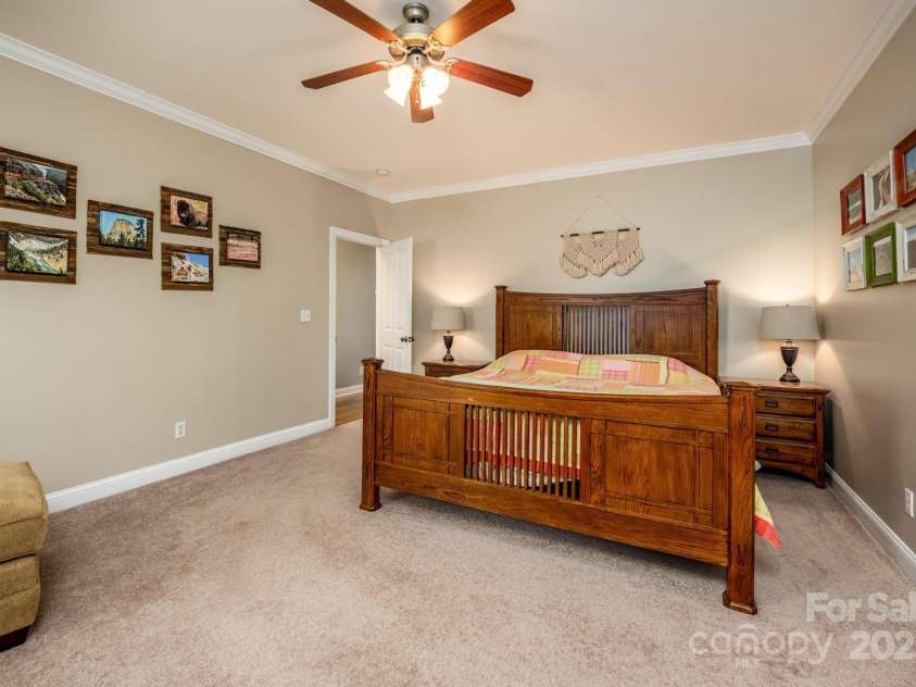 412 Wildlife Road, Troutman, NC 28166.  MLS# CAR4212088, YatesRealty ID 8174. Primary Bedroom