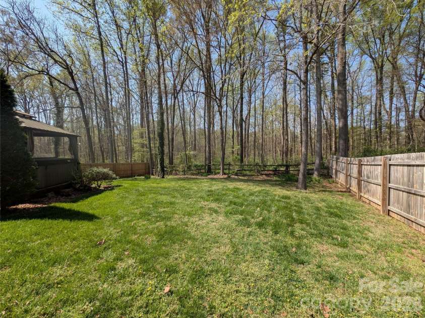 12329 Panthersville Drive, Charlotte, NC 28269.  MLS# CAR4362910, YatesRealty ID 8175. Backyard