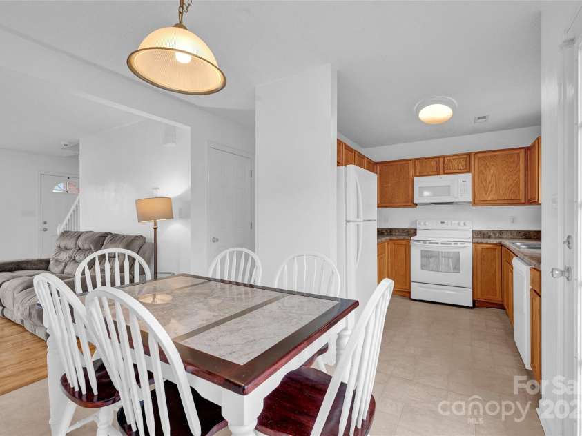 126 Newsome Road, Salisbury, NC 28146.  MLS# CAR4246225, YatesRealty ID 8180. Dining right off kitchen and living area for easy entertaining.