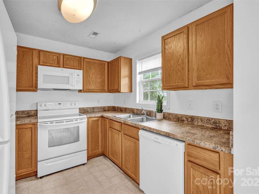 126 Newsome Road, Salisbury, NC 28146.  MLS# CAR4246225, YatesRealty ID 8180. Lots of kitchen cabinet storage