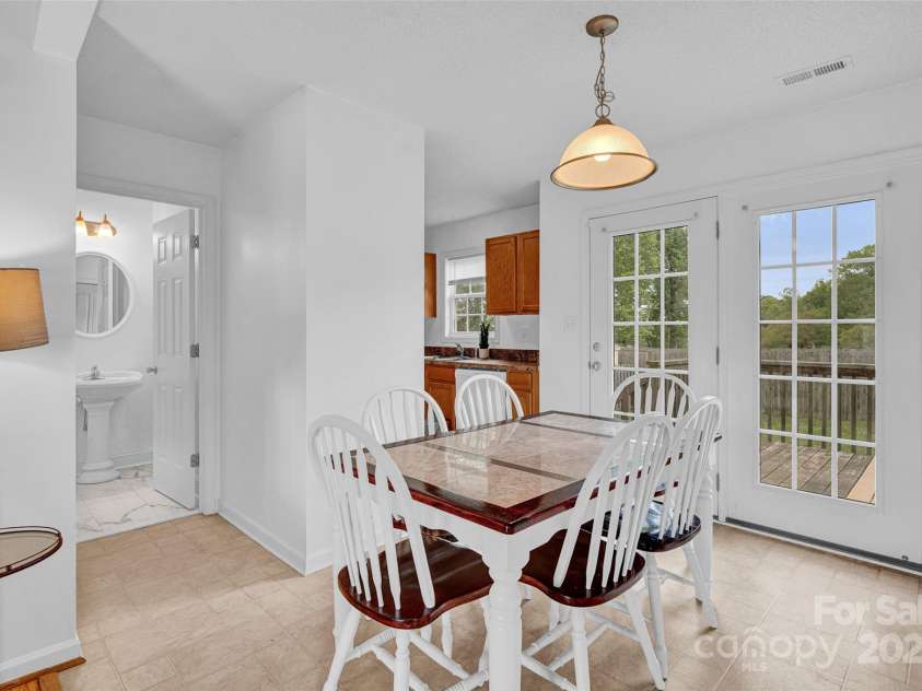 126 Newsome Road, Salisbury, NC 28146.  MLS# CAR4246225, YatesRealty ID 8180. Plenty of seating in the dining area!